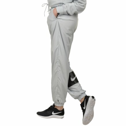 Спортивнi штани Nike W Nsw Pant Wvn Swsh - 108652, фото 2 - інтернет-магазин MEGASPORT