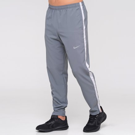 Спортивнi штани Nike M Nk Run Stripe Woven Pant - 127685, фото 1 - інтернет-магазин MEGASPORT