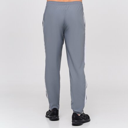 Спортивнi штани Nike M Nk Run Stripe Woven Pant - 127685, фото 3 - інтернет-магазин MEGASPORT