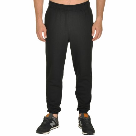 Спортивнi штани New Balance Essential Tapered - 105470, фото 1 - інтернет-магазин MEGASPORT