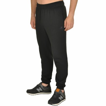 Спортивнi штани New Balance Essential Tapered - 105470, фото 2 - інтернет-магазин MEGASPORT