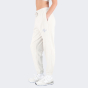 Спортивные штаны New Balance Essentials Reimagined Arch. Graphic Pant, фото 2 - интернет магазин MEGASPORT