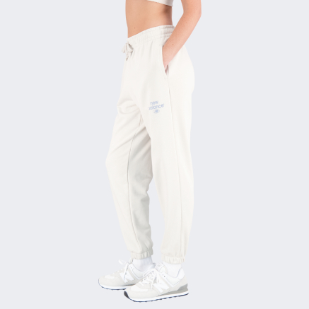 Спортивные штаны New Balance Essentials Reimagined Arch. Graphic Pant - 150427, фото 2 - интернет-магазин MEGASPORT