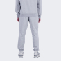 Спортивные штаны New Balance Essentials Stacked Logo Sweatpant, фото 2 - интернет магазин MEGASPORT