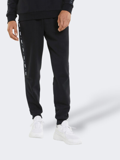 Спортивные штаны Puma ESS+ Tape Sweatpants FL cl - 148179, фото 1 - интернет-магазин MEGASPORT