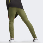 Спортивные штаны Puma EVOSTRIPE Pants DK, фото 2 - интернет магазин MEGASPORT