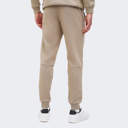 Спортивнi штани Puma ESS+ Tape Sweatpants FL cl - 167532, фото 2 - інтернет-магазин MEGASPORT