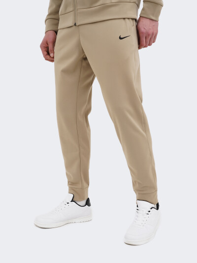 Спортивнi штани Nike M NK TF PANT TAPER - 168620, фото 1 - інтернет-магазин MEGASPORT