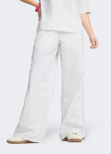 Спортивні штани Puma DARE TO Relaxed Woven Zip-Off Pants op - 172153, фото 1 - інтернет-магазин MEGASPORT
