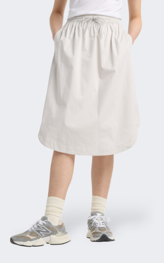 Спідниця New Balance Twill Midi Skirt - 172280, фото 1 - інтернет-магазин MEGASPORT