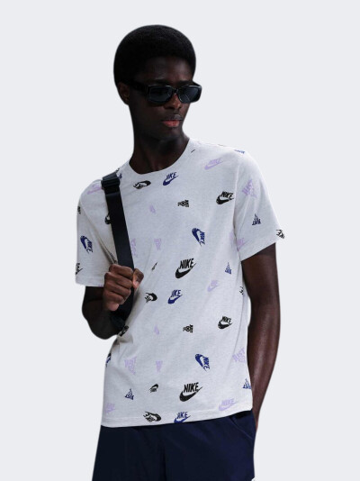 Футболка Nike M NSW TEE 12MO AOP SP25 - 173210, фото 1 - інтернет-магазин MEGASPORT