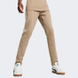 Спортивнi штани Puma EVOSTRIPE Pants DK, фото 1 - інтернет магазин MEGASPORT
