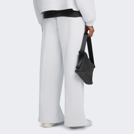 Спортивнi штани Puma WARDROBE ESS Relaxed Pants DK - 173949, фото 2 - інтернет-магазин MEGASPORT