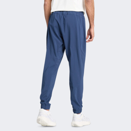 Спортивнi штани New Balance Sport Essentials Woven Pant - 175516, фото 2 - інтернет-магазин MEGASPORT