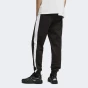 Спортивнi штани Puma ESS T7 Poly Pants, фото 2 - інтернет магазин MEGASPORT